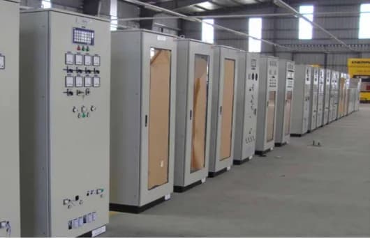 Row of sheet metal electrical cabinets in the workshop